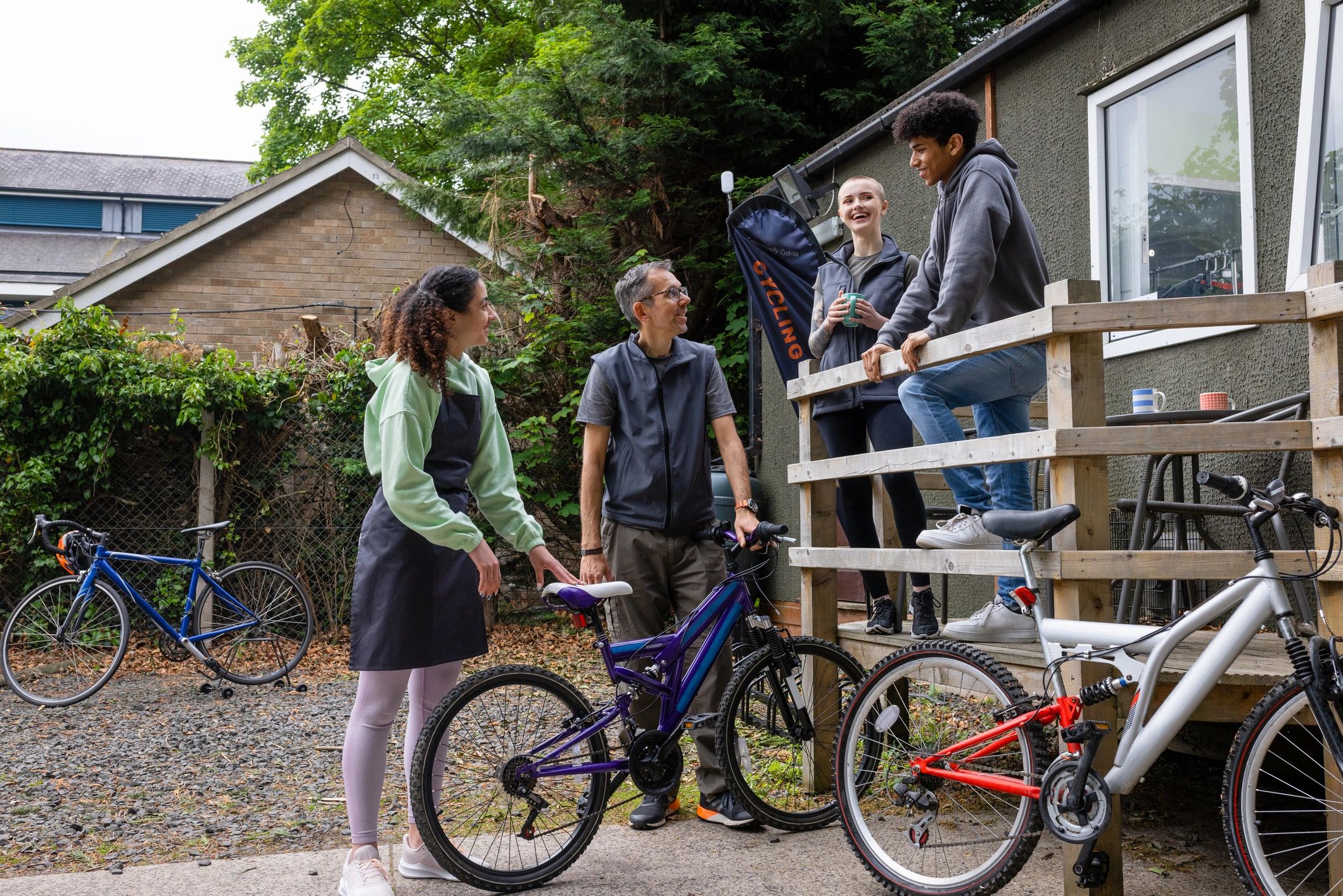 Group gathered outdoors at a community-style bike event