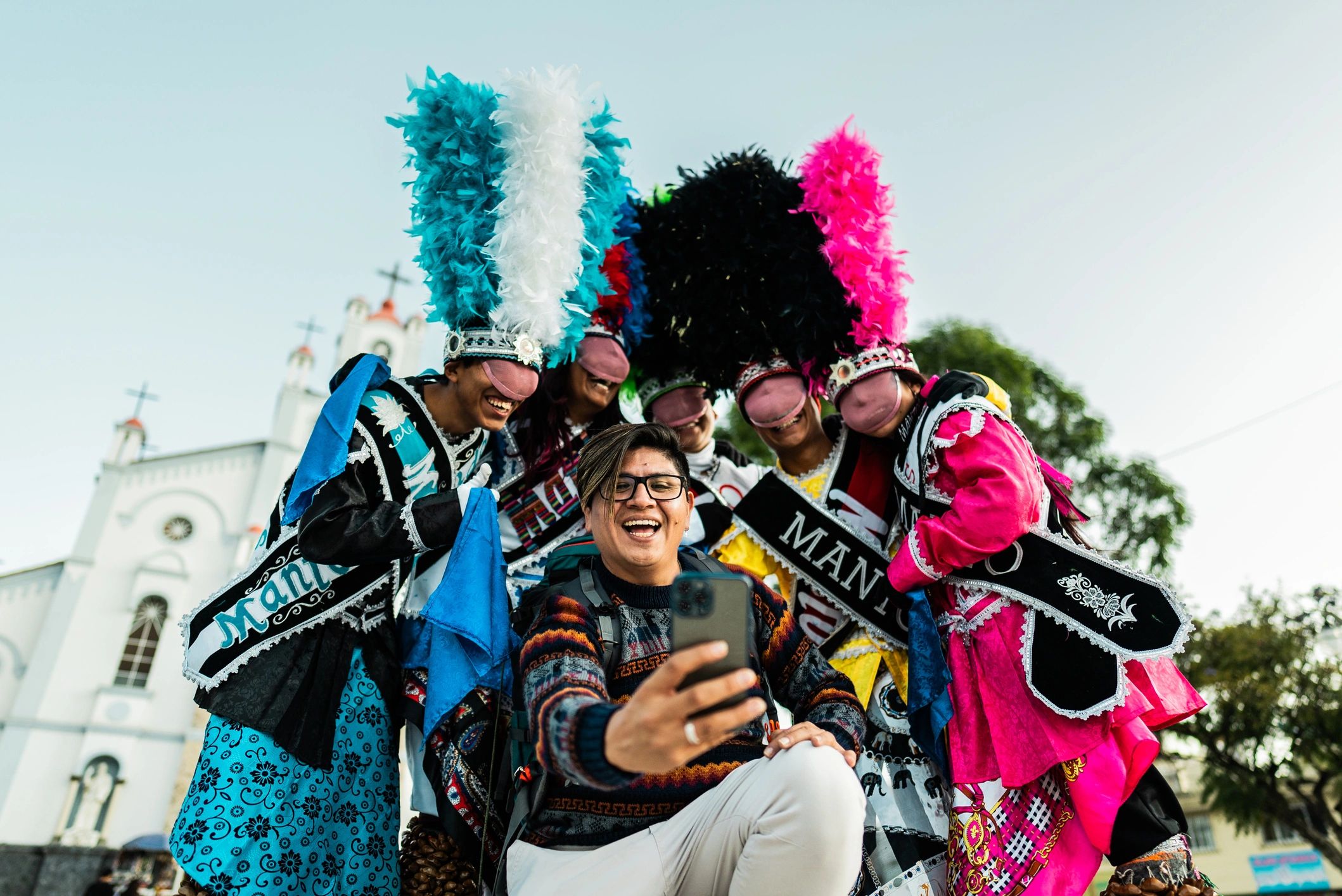 Visitor taking a selfie during a festive themed gathering